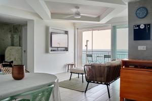 a living room with a view of the ocean at Amazing Oceanfront 2br in Oropesa del Mar
