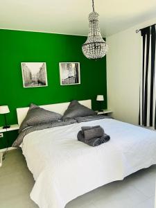 Postel nebo postele na pokoji v ubytování Apartment im Grünen mit Stil