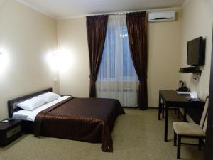 Postel nebo postele na pokoji v ubytování Noy Hotel + 37 fotografií