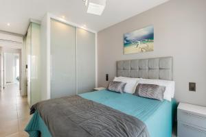 Ένα ή περισσότερα κρεβάτια σε δωμάτιο στο Punta Prima Oasis Beach Fase 9 +103 φωτογραφίες