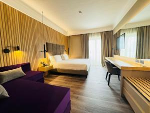 Giường trong phòng chung tại Crowne Plaza Rome St. Peter's by IHG