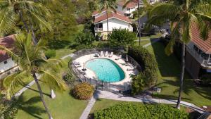 an overhead view of a swimming pool in a yard at Keauhou Palena 901 in Kailua-Kona