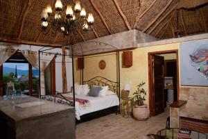 Postel nebo postele na pokoji v ubytování Casa Miura Hotel Boutique + 102 fotografií