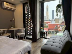 Postel nebo postele na pokoji v ubytování Cozy Mini Theatre - Victory Monument - 3 pax + 49 fotografií