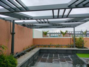 Сад в Casa Teal Near Airport Symbiosis Viman Nagar