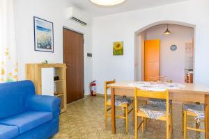 Posezení v ubytování Caminia - La baia incantata