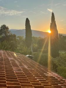 a view of the sunset from the roof of a building at Casin de Mori in Penna
