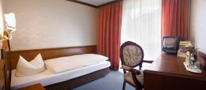 Postel nebo postele na pokoji v ubytování Post-Hotel