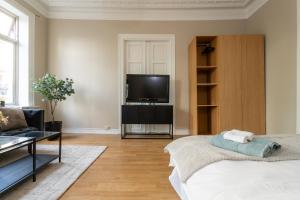 TV i/ili multimedijalni sistem u objektu Oslo Living