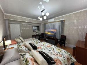 Ένα ή περισσότερα κρεβάτια σε δωμάτιο στο Departamento turístico 2