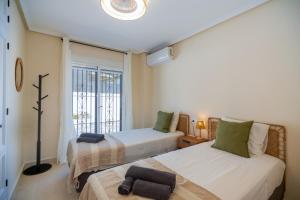 Ένα ή περισσότερα κρεβάτια σε δωμάτιο στο Villa Rosa Vista +21 φωτογραφίες