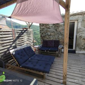 Posezení v ubytování Vue sur les montagnes Corses