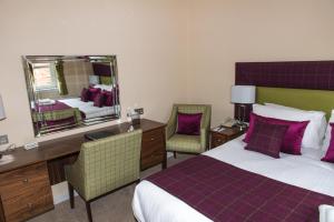 Postel nebo postele na pokoji v ubytování Park Hotel