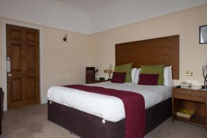 Postel nebo postele na pokoji v ubytování Park Hotel