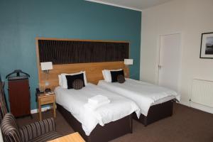 Postel nebo postele na pokoji v ubytování Park Hotel