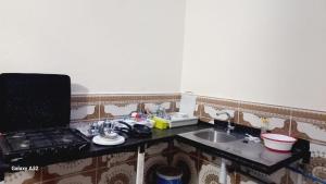 a kitchen with a sink and a counter top at Haute Anza in Agadir