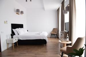 Ένα ή περισσότερα κρεβάτια σε δωμάτιο στο D36 Residence
