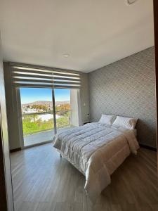 Ένα ή περισσότερα κρεβάτια σε δωμάτιο στο Luxury Apartment