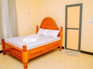 Postel nebo postele na pokoji v ubytování Nungwi Mordern apartment