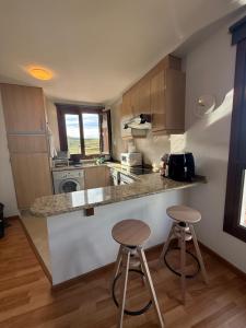 Kuchyň nebo kuchyňský kout v ubytování el mirador de ona