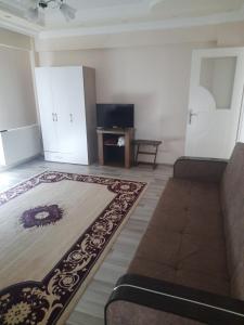 Μια τηλεόραση ή/και κέντρο ψυχαγωγίας στο Your Private Home at Lake Salda