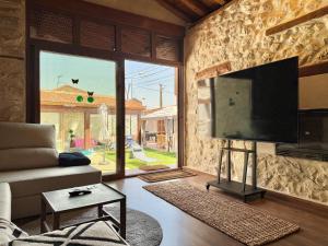 TV a/nebo společenská místnost v ubytování Casa Villa Rosalia