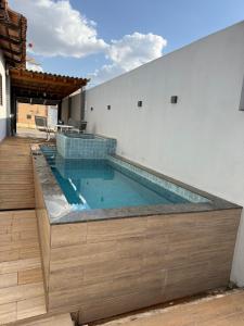 Bazén v ubytování Residência Santa Bárbara OFICIAL nebo v jeho okolí