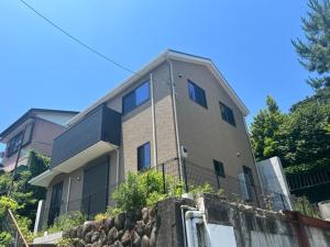 a house on top of a stone wall at Fabulous Shiroyama - Vacation STAY 17734 in Odawara