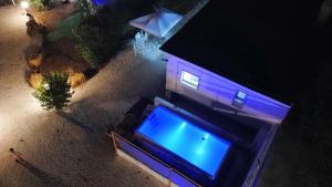 an overhead view of a house with a blue screen at La casetta in Martina Franca