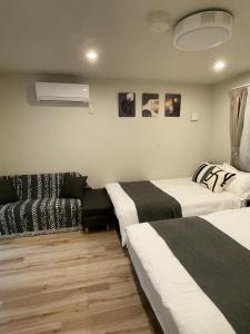 Ένα ή περισσότερα κρεβάτια σε δωμάτιο στο T-HOTEL Iriya - Vacation STAY 94071v