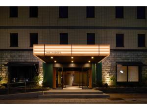a building with a large entrance to a building at BASE LAYER HOTEL NAGOYA NISHIKI - Vacation STAY 98099v in Nagoya
