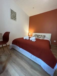 Katil atau katil-katil dalam bilik di Magnifique Petit Marnais Parking gratuit-linge inclus