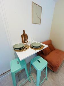Ruang duduk di Magnifique Petit Marnais Parking gratuit-linge inclus