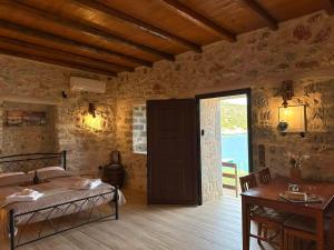 Ένα ή περισσότερα κρεβάτια σε δωμάτιο στο Villa Lagadaki the sea view