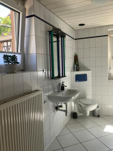 Ένα μπάνιο στο Ferienwohnung im Denkmal