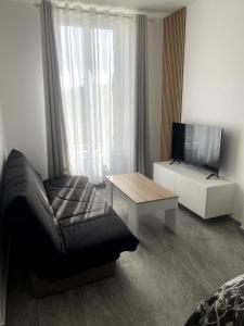 Μια τηλεόραση ή/και κέντρο ψυχαγωγίας στο Chez soi, ailleurs
