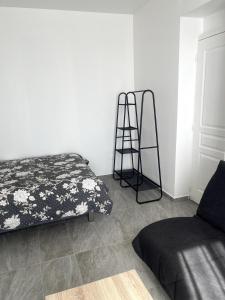 Ένα ή περισσότερα κρεβάτια σε δωμάτιο στο Chez soi, ailleurs +2 φωτογραφίες