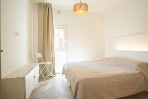 Postel nebo postele na pokoji v ubytování Casa Adriatica 89