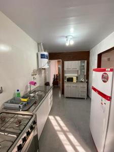 Kuchyň nebo kuchyňský kout v ubytování PH con cochera