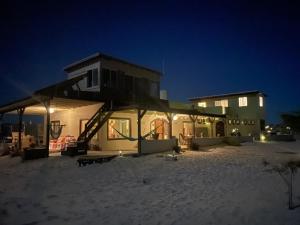 a house sitting in the snow at night at 7 Arches in San Felipe