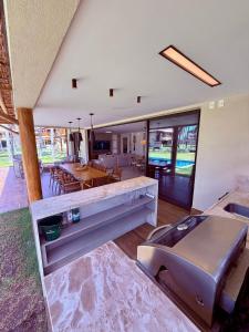 a large living room with a couch and a table at Casa Fortim Eco Village in Fortim
