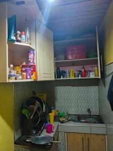 a kitchen with a sink and a counter top at Bahati Homes in Eldoret