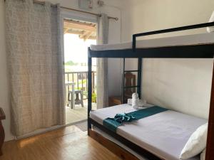 Ένα ή περισσότερα κρεβάτια σε δωμάτιο στο Casita Lodge