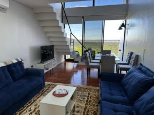 Posezení v ubytování Macondo Apartamento Luxury