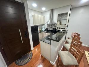 Kuchyň nebo kuchyňský kout v ubytování Macondo Apartamento Luxury