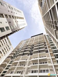 two tall buildings looking up into the sky at Juvycondo in Davao City +27 photos