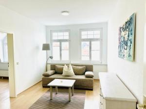 Posezení v ubytování Möblierte Wohnung im Stadtzentrum + 2 fotografie