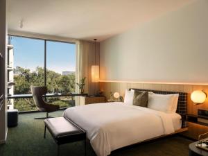 Postel nebo postele na pokoji v ubytování The Loren Hotel Austin + 50 fotografií