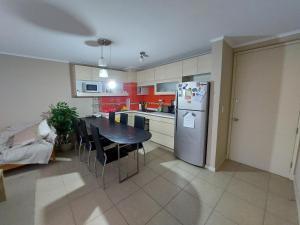 Köök või kööginurk majutusasutuses Depto Laguna Vista Algarrobo