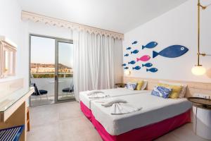 Postel nebo postele na pokoji v ubytování Orion Hotel + 37 fotografií